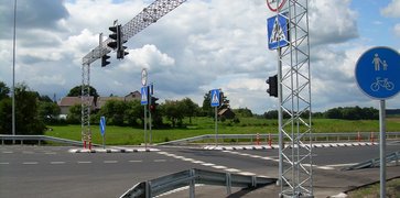 Grąžino žalią mirksintį šviesoforo signalą